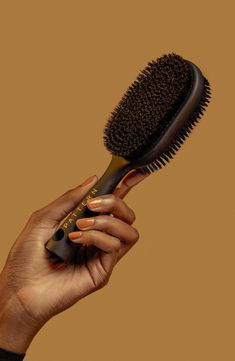 What it is: A double-sided Bristle Brush that polishes and refines strands.Who it's for: Ideal for curly, coily and tight hair textures.What it does: The 2-in-1 brush features nylon bristles to finesse flyaways and boar bristles to stick tighter styles. The lightweight brush gently polishes and refines strands. How to use: Use the brush on wet or dry hair to smooth hairstyles. Use as desired. 2.95" x 1.77" x 8.66" Premium boar bristles/nylon fibers/ABS/rubber Imported Smooth Hairstyles, Smoothing Brush, Curly Hair Brush, Best Hair Brush, Black Hair Updo Hairstyles, Pattern Beauty, Round Hair Brush, Scrub Corpo, Boar Bristle Brush