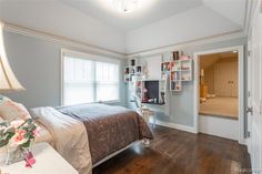 the bedroom is clean and ready to be used as a home office or guest room