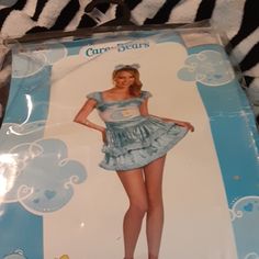 an image of a woman in a blue dress on the cover of a bed sheet