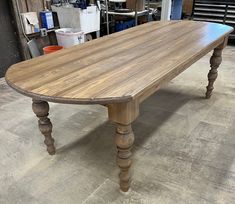 an old wooden table in a shop