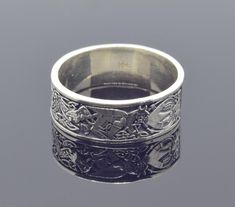 Scandinavian Viking Ring, Norse Ornament Ring, Celtic Wedding Band, His and Hers Rings. ArmenianJewelryHouse personnel do everything to complete the customer's safety and experience.  Item Details  - Material: 925 Sterling Silver - Weight ~ 7.00 Grams(Depending on size) - Width: 8mm - Gender: Male / Female - Finish: Oxidized Silver - The product is handmade and its weight may vary up to 1.00 grams. - We recommend using the main photo version of the item(If there are any other options). ✔ Shipped Norse Ornament, Wedding Band His And Hers, Wedding Band His, His And Hers Rings, Celtic Wedding Bands, Viking Ring, Celtic Wedding, Oxidized Silver, Armenia