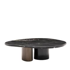 an oval table with black marble top and two metal pedestals on each side, against a white background