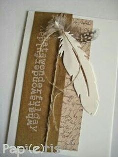 a card with a feather and some words on it