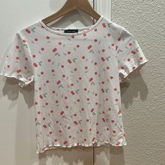 White Cropped Baby Tee With Cherry Print. Excellent Condition, Never Worn. Trendy Spring Tops With Strawberry Print, White Sweet Tops For Summer, Sweet White Summer Tops, Cute White T-shirt For Spring, Sweet White Crew Neck Top, Cute Strawberry Print Tops For Spring, Cute Patterned Cotton Tops, Cute Cotton Tops With Pattern, Cute Cotton Patterned Tops