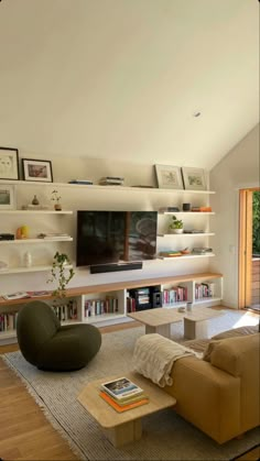 Lounge room, house inspo, couch, stone coffee table, tv shelving, wooden, book shelf Tv Shelving, Shelf Decor Living Room, Bookshelves In Living Room, Stone Coffee Table, Living Room Shelves, Table Tv, Apartment Inspiration