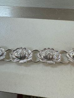 Beautiful Duane Craft water lily bracelet. The bracelet is sterling silver and is 7" long. It weighs 28.8 grams. Please feel free to ask any questions Lily Bracelet, Silver Water, Saint Augustine, Nov 6, Water Lily, Water Crafts, Chain Link Bracelet, Link Bracelets