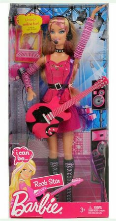 the barbie doll is holding a pink guitar