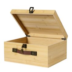 an open wooden box with leather straps on the bottom and inside, sitting on a white background