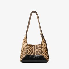 The Diamond Hobo in leopard print pony and vintage metallic leather expands on the signature Diamond family with stitched panels, resulting in a Diamond-shaped silhouette and a self-lined construction. It is designed with a single, adjustable shoulder strap. Familia Diamond, Bridal Flat Sandals, Bridesmaid Bags, Party Heels, Sneaker Dress Shoes, Jimmy Choo Shoes, Boot Bag, Day Bag, Metallic Leather