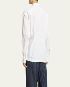 Dries Van Noten "Coulter" poplin shirt featuring a safetypin crossed waist detail    Point collar    Button placket    Long sleeves    Barrel cuffs    Yoked back    Slim fit    Side slits hem    Cotton    Made in Poland Cotton Poplin Shirt, Dries Van Noten, Poplin Shirt, Embroidered Shirt, Safety Pin, Collar Shirts, Cotton Poplin, Short Sleeve Shirt, Poland