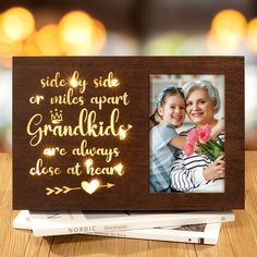 PRICES MAY VARY. 🎁UNIQUE MOTHERS DAY GIFTS FOR GRANDMA: Designed with engraved glowing warm words, MAYICIVO Wooden Best Grandma Gifts Glowing Grandma Picture Frame with Night Light is a perfect gifts for grandma, grandpa, nana, grandmother, mimi, gigi from granddaughter grandson grandkids. Showcase your love and appreciation in a unique and eye-catching way with this warm night light that combines heartfelt words and a cherished photo, making it a meaningful nana gifts grandma birthday gifts gr Mothers Day Gifts For Grandma, Grandma Frame, Gifts For Nana, Grandma Picture Frame, Nana Christmas, Grandpa Christmas Gifts, Nana Christmas Gifts, Grandma Photos, Gifts Grandma