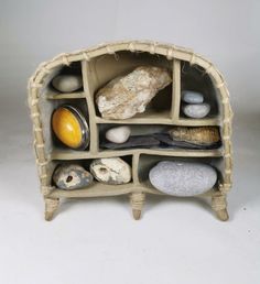 a shelf filled with rocks and other items