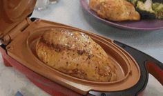 there is a pan with some food in it on the table next to another plate