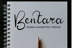 a notebook with the words ben tarara written in cursive writing on it