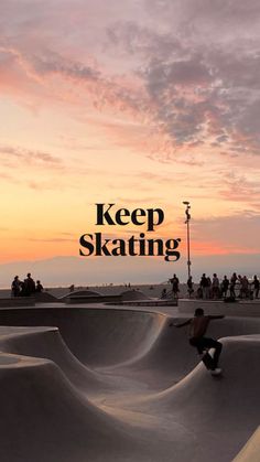 a man riding a skateboard up the side of a ramp at a skate park