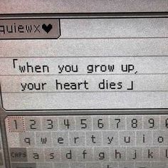 an old computer keyboard with the words when you grow up, your heart dies l