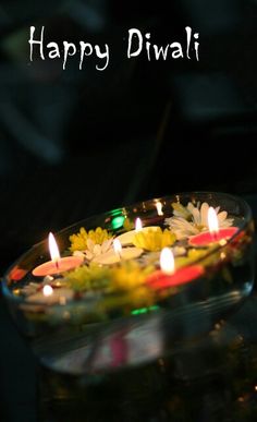 there are many candles that have been placed in the bowl for someone to light up