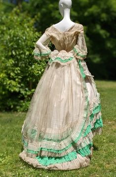 CIVIL WAR 1860’S 3 PC GREEN & OFF WHITE RUFFLED GAUZE DRESS W BELL SLEEVES | eBay 1869 Fashion, Victorian Fancy Dress, Rococo Era, 1860s Dresses, 1850s Fashion, Augusta Auctions, Victorian Dresses, 1860 Fashion, Era Fashion