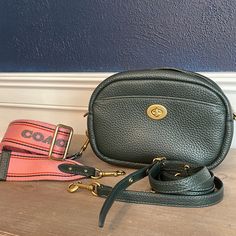 Beautiful Soft Pebbled Hunter Green Leather. Comes With A Leather Strap And A Coach Branded Guitar Style Strap. Limited Edition. Brass Hardware 9” Length 6.5” Height 3” Width In Perfect Condition No Scratches Or Stains. Comes With Dust Bag. No Low Ball Offers. Someone Out There Will Find This Treasure. Crossbody Camera Bag, Coach Crossbody, Hunter Green, Green Leather, Brass Hardware, Coach Bags, Camera Bag, Leather Straps, Dust Bag