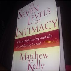 the seven levels of intimacy by matthew kelly is displayed in front of a sign