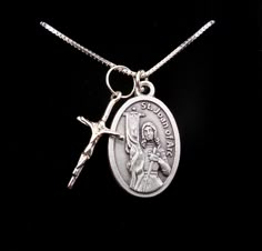 "Customized Saint Joan of Arc Sterling Silver Necklace Elegant Sterling Silver 18\" Box Chain Solid Sterling Silver Box chain made in Italy with 10mm rectangular clasp. Solid Sterling Silver Crucifix (21x12mm) Saint Medal Made in Italy. Metal Alloy, High quality medals. Size: 22×15mm (1″ tall) Comes in a gift box ready for giving. Upgrade to a 20\" or 24\" chain here. https://www.etsy.com/listing/802569876/upgrade-chain-length-to-20-or-24-inch?ref=shop_home_active_1 16\" Sterling Box Chain Also Santa Joana D'arc, Confirmation Jewelry, Saint Necklace, St Joan Of Arc, Saint Joan Of Arc, St Joan, Crucifix Necklace, Catholic Jewelry, Necklace Elegant