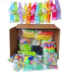 a box filled with lots of different colored stuffed animals hanging from it's sides