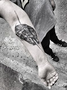 a person with a tattoo on their foot