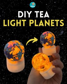 someone is holding two tea light planets in their hand with the text diy tea light planets