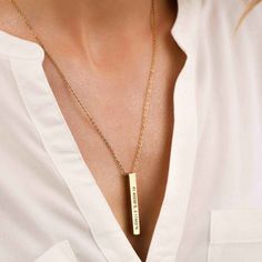 PERSONALIZED VERTICAL BAR NECKLACE This stylish necklace with it's free moving square bar pendant can be personalized to create a treasured and special gift for a loved one. The bar can be engraved with your special message, a name, or date which the recipient can choose to wear with the message showing or turn the slider to keep it secret. CHARACTER LIMIT Up to 12 characters per bar Up to 4 sides engraving ITEM SPECIFICATIONS • Material: High Quality Solid 925 Sterling Silver• Finish: 925 Sterl Minimalist Rectangular Bar Necklace As Personalized Gift, Necklace Name Design, Vertical Bar Necklace, Square Bar, Bar Necklace Personalized, Bar Pendant Necklace, Engraved Pendant, Vertical Bar, Pearl Decor