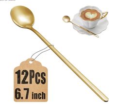 two spoons and a teacup with a price tag