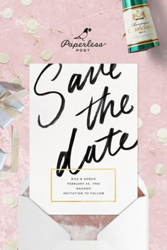 save the date card and envelope with gold confetti on pink paper, surrounded by confetti