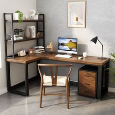 a corner desk with a computer on it