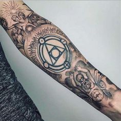 a man's arm with an illuminate tattoo on the forearm and hand