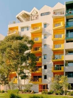 an apartment building with balconies and balconies on each floor