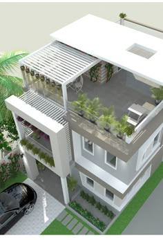 an aerial view of a two story house with plants growing on the balconies