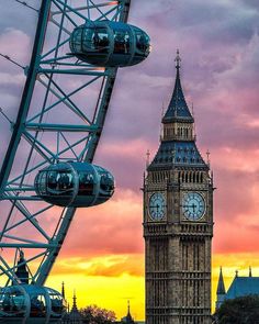 the big ben clock tower towering over the city of london, england at sunset or dawn