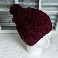 This gorgeous hat is super soft and incredibly stylish... a great addition to your winter wardrobe. In a gorgeous burgundy, this hat is sure to keep you warm and cozy in the cooler weather. Size: adult This item is ready to ship. Cozy Solid Color Cap, Winter Burgundy Short Brim Hat, Classic Burgundy Hats For Winter, Classic Burgundy Winter Hat, Burgundy Brimmed Winter Hat, Casual Burgundy Hat One Size Fits Most, Winter Burgundy Hat With Curved Brim, Red Cap For Cold Weather, Red Slouchy Hat For Winter