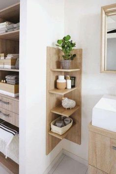 the bathroom is clean and ready to be used as a storage area for towels or other items