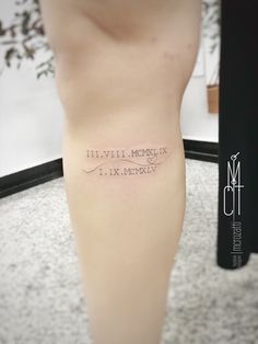 a person with a tattoo on their leg