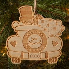 a wooden ornament hanging from a christmas tree