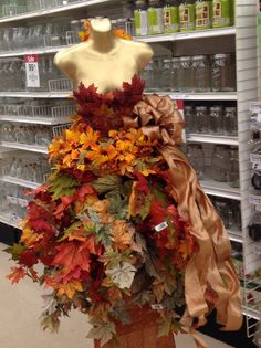 a dress made out of leaves in a store