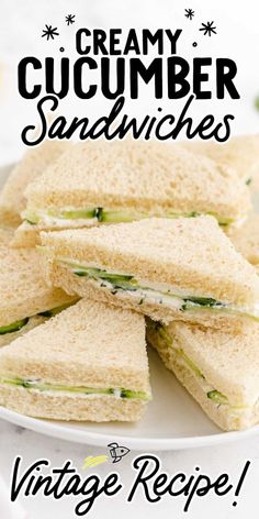 a white plate topped with sandwiches on top of a table