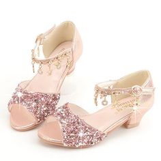 A must-have for your little girl's tutus, ballerinas and another fancy get-up. These glitter shoes are great for any occasion. The shoes are designed with an anti-slip Rubber sole, heel high 1.5 Inches These girls’ open-toe sandals with buckle closure, are easy for kids to take on or off. Great wedding flower girls shoes, Super comfortable, perfect for school, party, wedding or daily wear. Good to match with dress, jeans or other daily clothes Upper Material: PULining Material: PULeather Style: Girls Glitter Shoes, Healthy Design, Sequin Sandals, Sequin Shoes, Flower Girl Shoes, Glitter Flats, Sparkly Shoes, Girls Heels, Bling Shoes