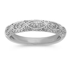 an antique style wedding ring with diamonds