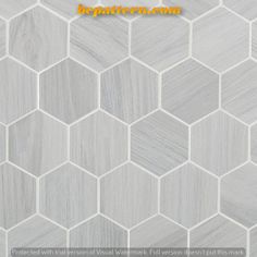 the tile is white and grey with hexagonal pattern