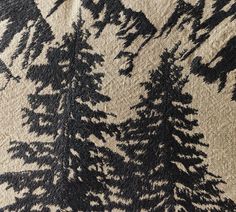 a black and white tree pattern on fabric