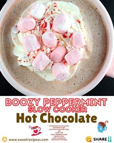 there is a bowl of hot chocolate with marshmallows in it and the words boozy peppermint slow cooker