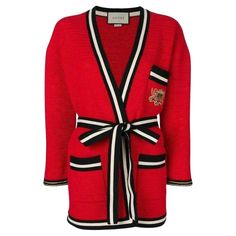 This red striped hem cardigan-coat is crafted from a cotton blend Deep V neck Long sleeves Belted waist Striped hem Logo chest pocket and front patch pockets. Black and cream ribbed hems. Composition: Cotton 55%, Polyamide 45% Trimming: 54% Metallised fiber, 46% polyamid Designer Style ID: 519840X9T02 Made in Italy Gucci Cardigan, Gucci Collection, Velvet Coat, Knitted Tops, Cardigan Long, Black And Cream, Striped Cardigan, Shearling Jacket, Cardigan Coat