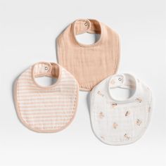 Oh-so-soft and comfy, our set of 100% organic cotton gauze baby bibs puts three adorable designs in one sweet and highly giftable bundle. Including one solid, one striped and one hand-drawn baby animal print, the lightweight, absorbent bibs feature a color scheme of playful pink and ivory. Complete the look with our coordinating Baby's First burp cloths and sheet sets sold separately.   • 100% organic cotton gauze, grown without chemicals or pesticides  • Set includes three bibs  • Soft, absorbe Bunny Fabric, Skin Hand, Baby Animal Prints, Kids Gear, Bib Set, Weaving Process, Pink Mini, Burp Cloths, Baby Bibs