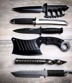 several different types of knives on a table